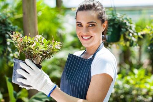Volunteers and staff preparing donated plants for community use